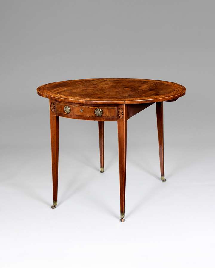 A fine George III period oval Pembroke table